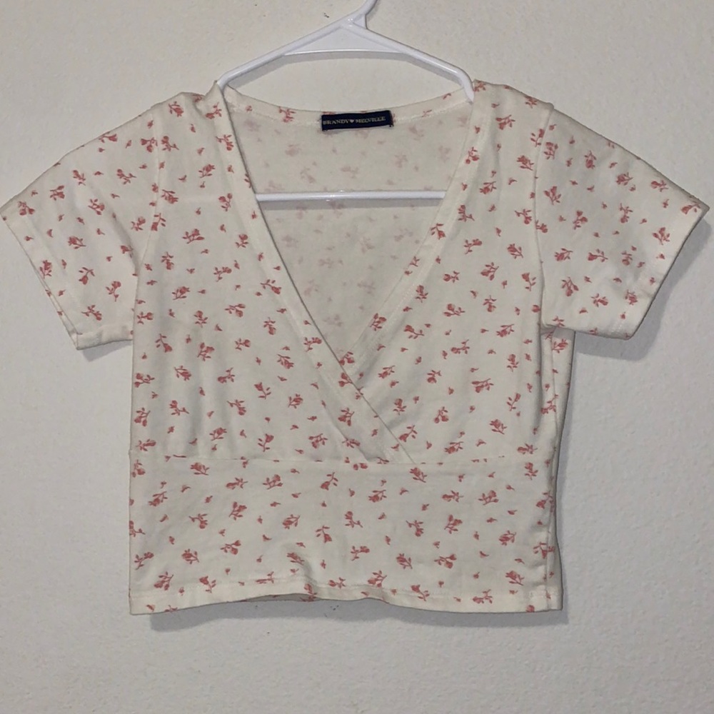 Brandy Melville. White and pink floral crop top